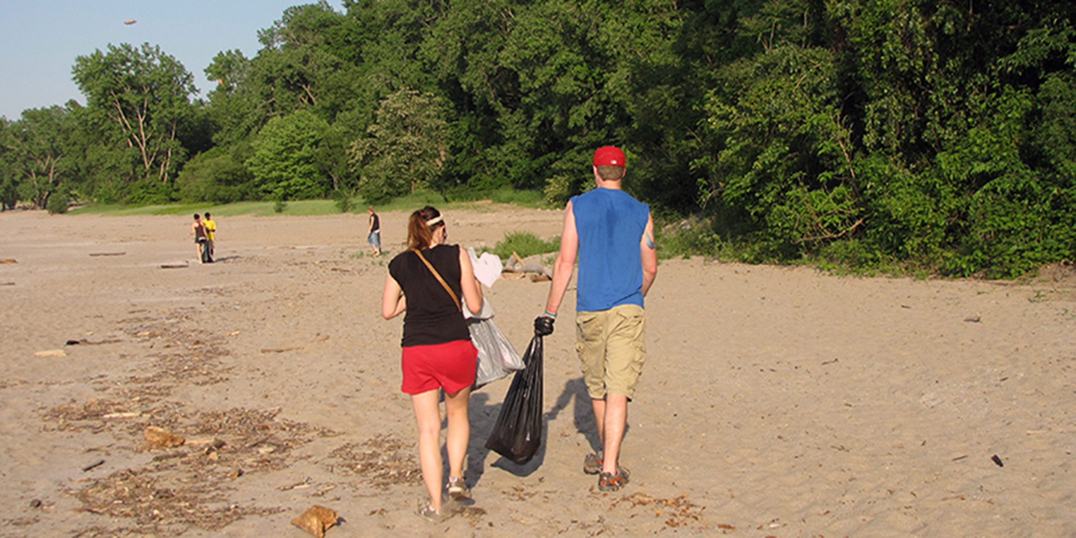 Volunteers cleaning up a Lake Erie beach.