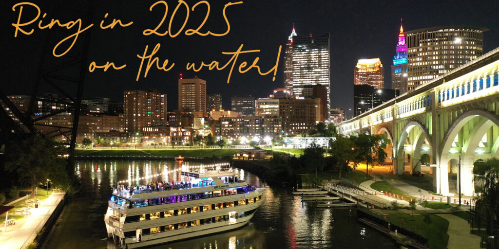 Lady Caroline in front of the Cleveland Skyline on the Cuyahoga River.