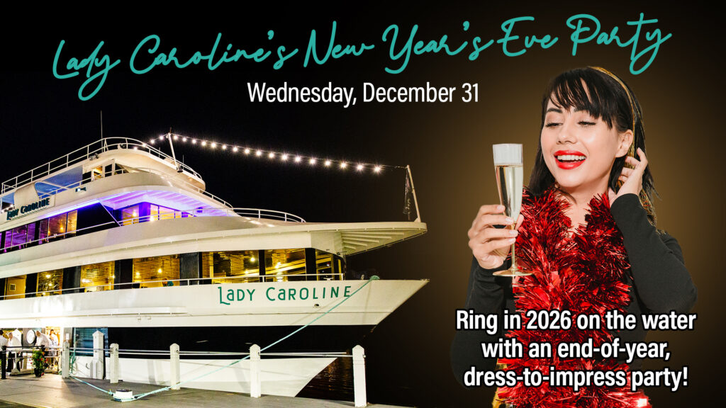 Woman in festive clothing with a champagne glass in front of Lady Caroline cruise ship at night